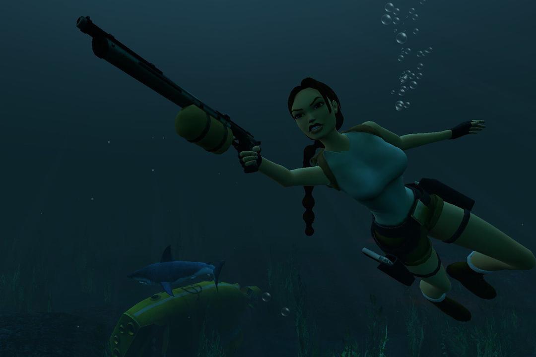A Photo Mode screenshot of Lara Croft swimming near a shark in Tomb Raider I-III Remastered.