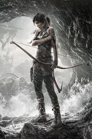 Lara Croft standing in a dark sea cave in Tomb Raider (2013).