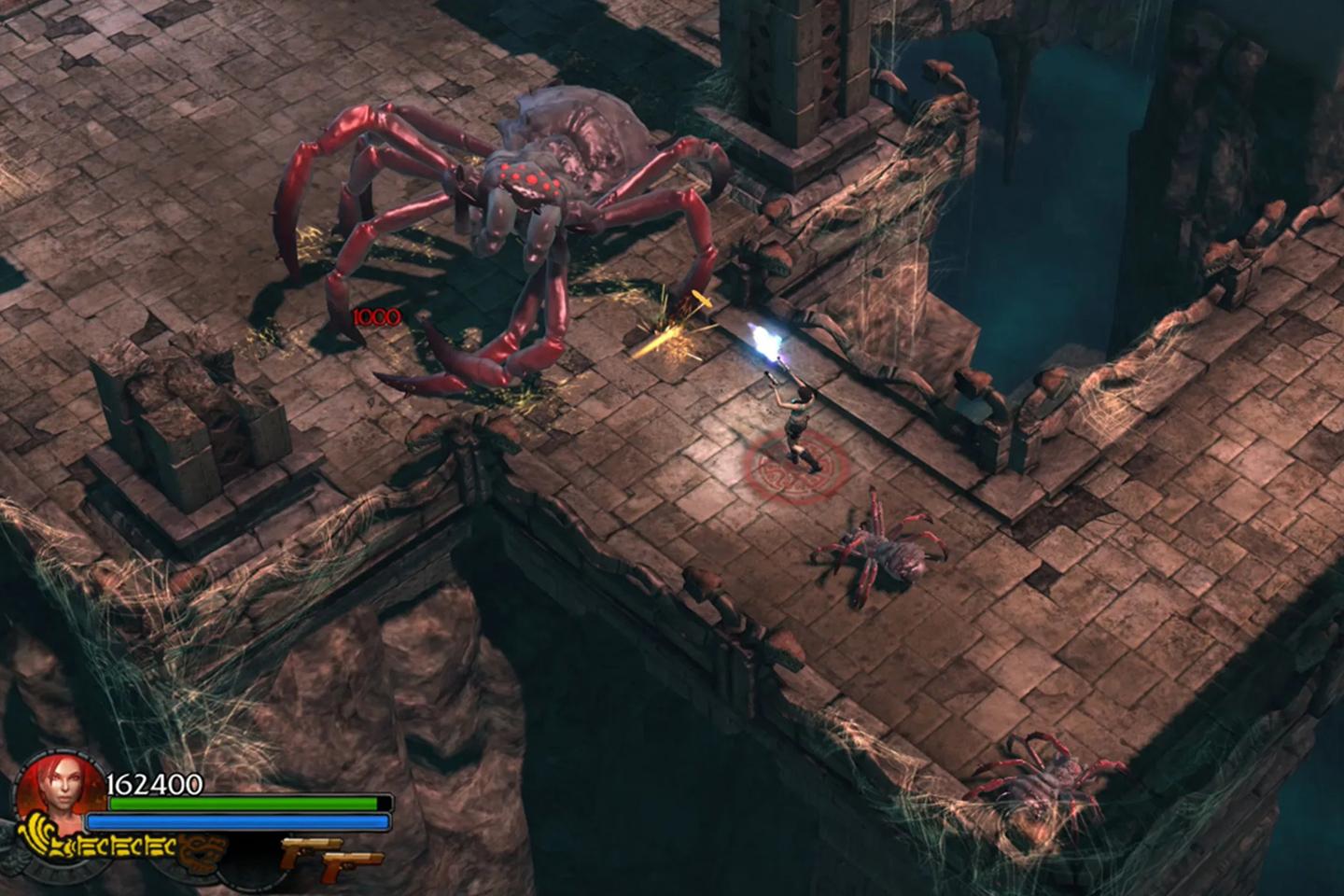 An action-packed screenshot from a Tomb Raider game featuring a character confronting a giant spider on a narrow stone bridge above a deep abyss, with smaller spiders nearby.