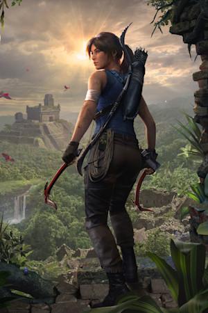 Lara Croft standing in a jungle with an ancient city in the background.